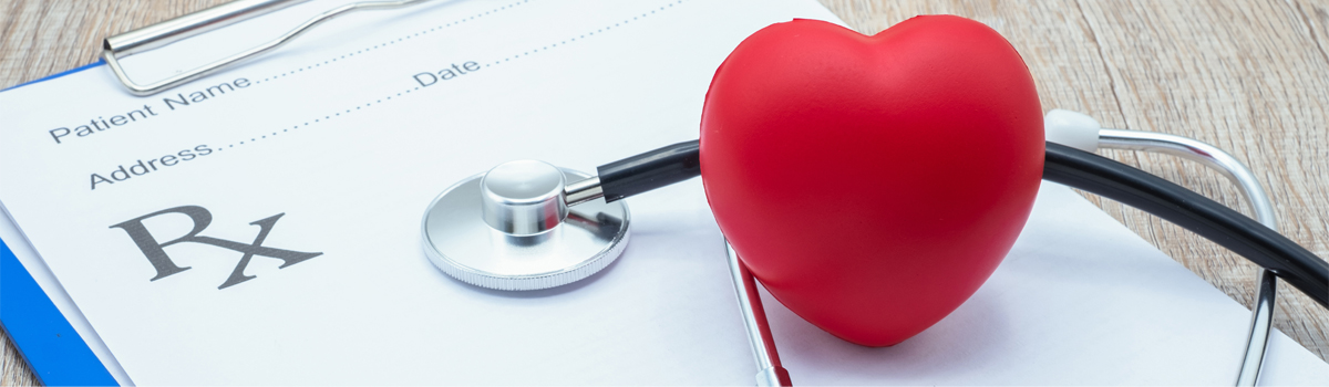 Medical image of stethoscope and heart on clipboard